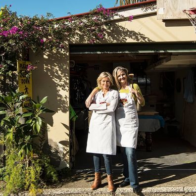 Katherine Westwood and Sophie Gilliatt stand outside the shed where they began The Dinner Ladies meal delivery service.