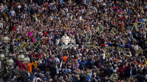 Pope Francis leaves after celebrating the Palm Sunday's mass in St. Peter's Square at The Vatican Sunday, April 2, 2023