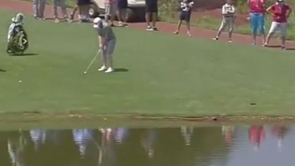 Pro golfer uses the water to his advantage 