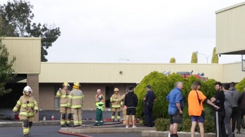Emergency services gather outside a motel in South Australia after a blaze erupted in one of the rooms.