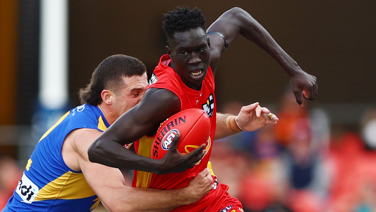 GOLD COAST, AUSTRALIA - JULY 31: Mac Andrew of the Suns in action during the round 20 AFL match between the Gold Coast Suns and the West Coast Eagles at Metricon Stadium on July 31, 2022 in Gold Coast, Australia. (Photo by Chris Hyde/Getty Images)
