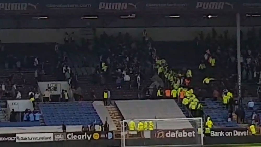 Burnley clash with Hannover abandoned after crowd trouble