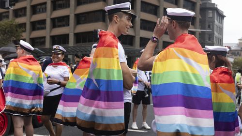 Participants prepare for the start of Sydney's 2024 Gay and Lesbian Mardi Gras Parade.