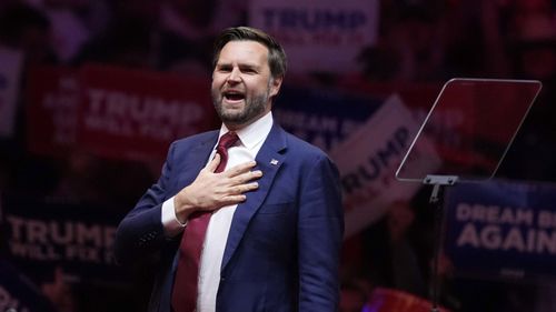 Republican vice presidential nominee Sen. JD Vance, R-Ohio, gestures before Republican presidential nominee former President Donald Trump at a campaign rally at Madison Square Garden, Sunday, Oct. 27, 2024, in New York. (AP Photo/Evan Vucci)