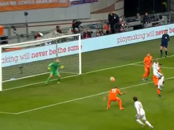 Robin Van Persie heads the ball toward the Dutch goal. (Supplied)