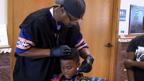 US barber offers free haircuts to school kids if they read aloud