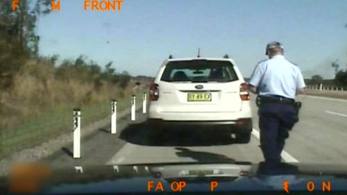The officer pulled Mr Agius over for driving in the right hand lane. (9NEWS)