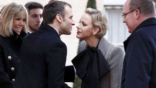 French President Emmanuel Macron and his wife Brigitte welcome Prince Albert II of Monaco and his wife Princess Charlene at the Elysee Palace ahead of the international ceremony for the Centenary of the WWI Armistice in Paris.