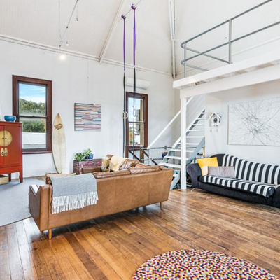 Gymnastic rings in the living room of quirky apartment for sale in Western Australia