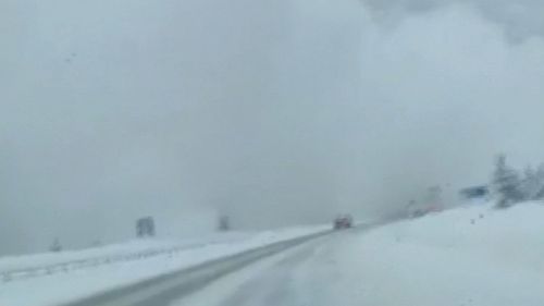 Video captured the moment a car was hit by an avalanche.