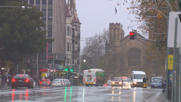 Heavy rain and storm clouds over an Australian urban area