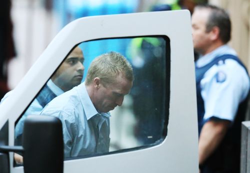 Adrian  Bayley being taken from a prison van and led into the Melbourne Supreme court in 2013. 