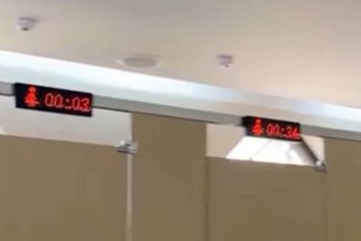 A video shows the countdown timers outside the toilet cubicles in China.