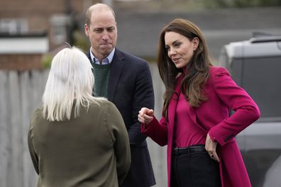 Kate, Princess of Wales, and Prince William are welcomed for a visit to Windsor Foodshare in Windsor, Thursday, Jan. 26, 2023 