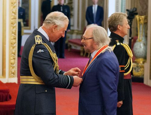 After being knighted at the palace by Prince Charles on Tuesday, the 71-year-old songwriter said: "If it was not for my brothers, I would not be here". Picture: PA
