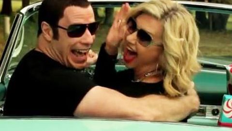 Cheese is the word: Olivia Newton-John and John Travolta line dance and re-enact <i>Grease</i> in crazy clip