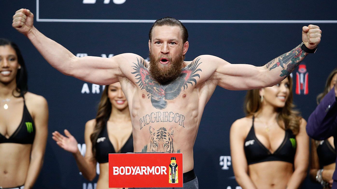 Conor McGregor poses during the weigh-in for the UFC 246 
