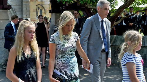 Charlotte and Arthur Inglis (centre) are seen during the funeral service for their daughter. (AAP)