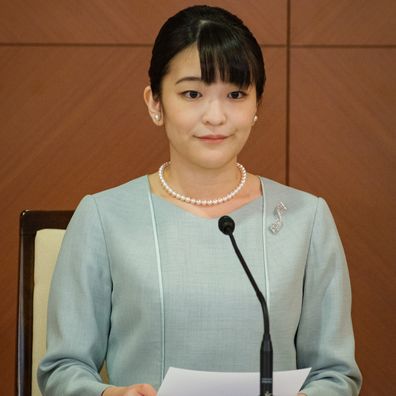TOKYO, JAPAN - OCTOBER 26: Princess Mako, the elder daughter of Prince Akishino and Princess Kiko, and her husband Kei Komuro (not pictured), a university friend of Princess Mako, attend a press conference to announce their marriage registration at Grand Arc Hotel on October 26, 2021 in Tokyo, Japan. Princess Mako married Kei Komuro today at a registry office following a relationship beset with controversy following the revelation that Mr Komuros mother was embroiled in a financial dispute with 