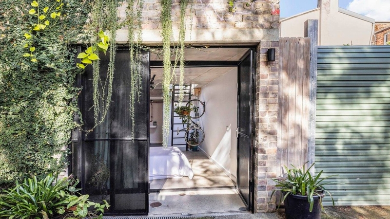 Hip $2.6m Sydney terrace has a clever hatch to a self-contained studio
