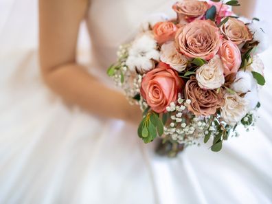 Bride holding flowers