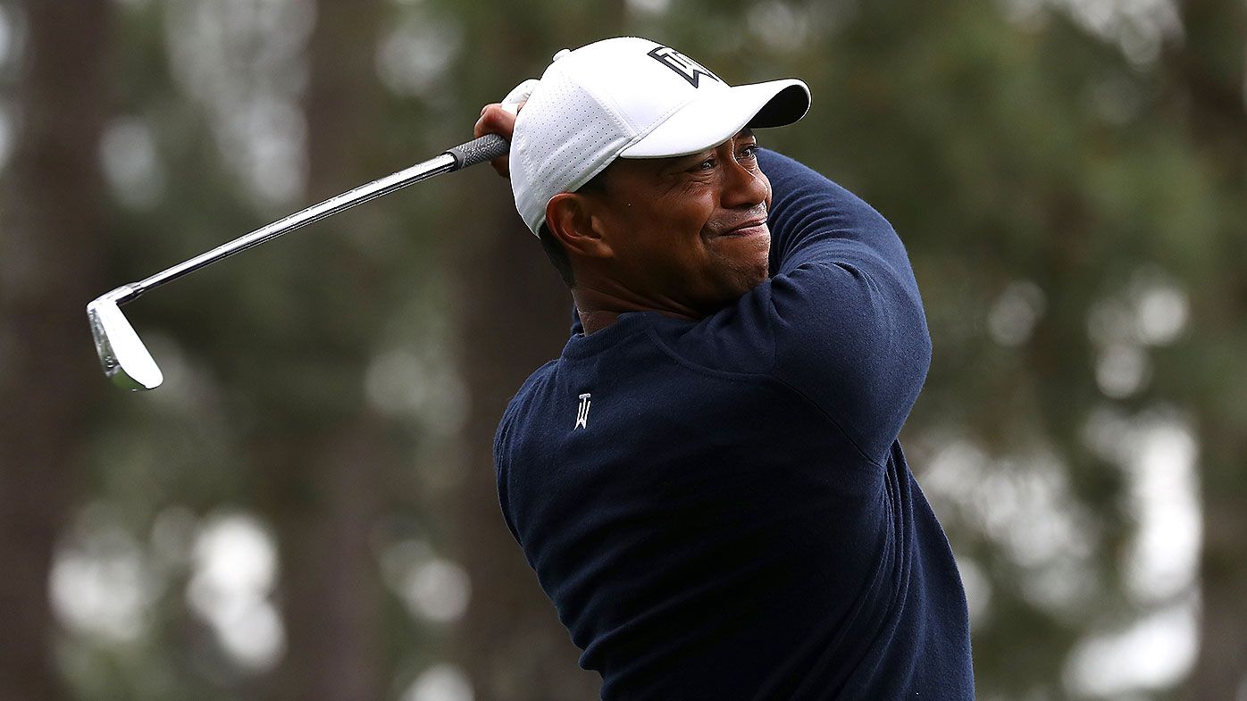 Tiger Woods of the US hits his tee shot
