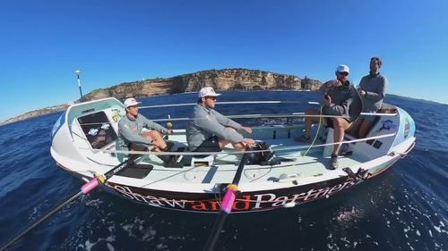 Four young men row 5000km across Atlantic Ocean for charity.