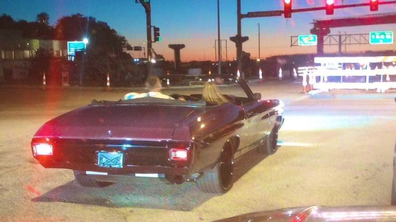 Taylor Swift and Travis Kelce getting away in his car following the Chiefs game.