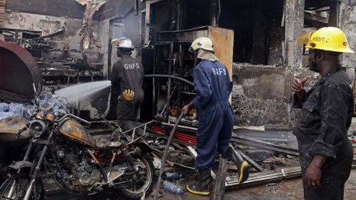 Fire kills 90 in Ghana as people seek flood refuge in petrol station