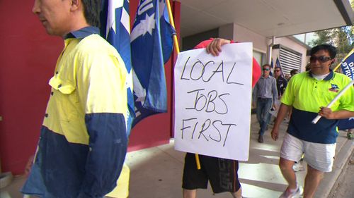 The workers claim they're owed $5 million. (9NEWS)