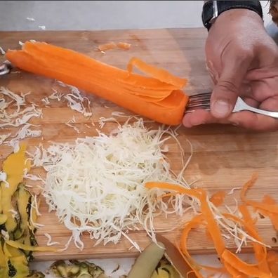 Kitchen Life Hack Video: Chop Vegetables With Pizza Cutter