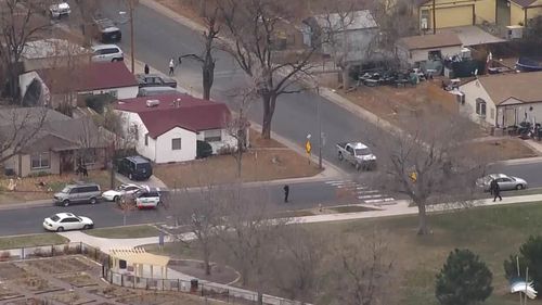 Police surround Nome Park, the scene of a shooting in Aurora, Colorado. (Picture: KMGH)