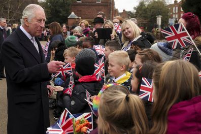 King Charles greets people as he and Queen Camilla visit Colchester Castle in Colchester, Britain, Tuesday, March 7, 2023