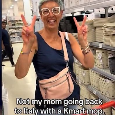 A mum from Italy buys a Kmart mop to take home with her