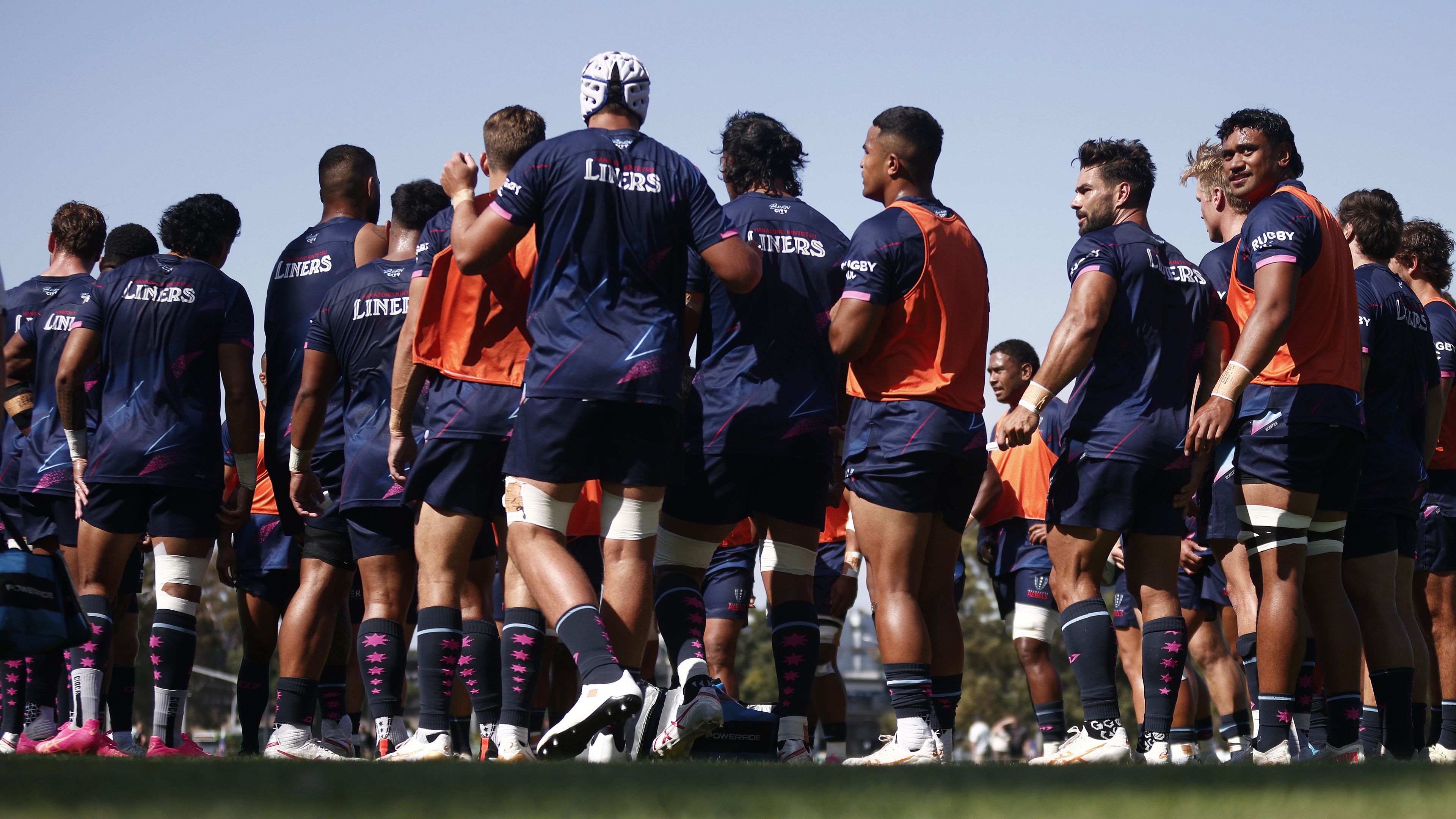 The Rebels huddle during a Super Rugby Pacific warm-up match.