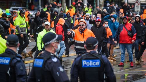 The Age, News, 20/09/2021, photo by Justin McManus. Construction workers protest outside the office of the CFMEU against mandatory vaccines in the construction industry.