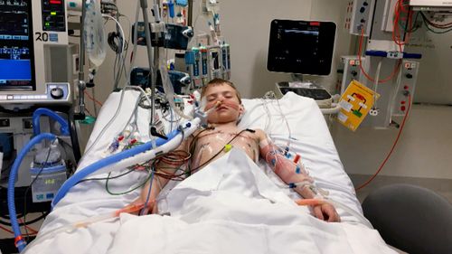 Mason Johnson was struggling to breathe and living on an oxygen tank after a viral infection destroyed his lungs in 2016. Picture: 60 Minutes