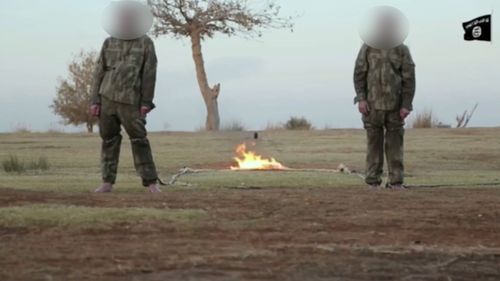 The graphic video purportedly shows two Turkish soldiers being burned alive. 