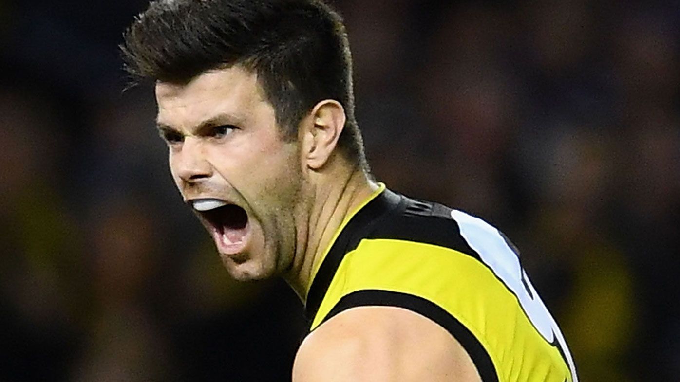 Richmond Tigers beat brave North Melbourne Kangaroos to stay top in AFL