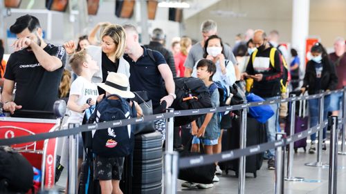 Sydney Airport is encouraging domestic travellers to arrive two hours before their departing flight this Easter school holidays in what's expected to be the busiest period for domestic air travel in two years.