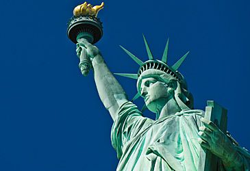 Which year is inscribed on the Statue of Liberty's tablet in Roman numerals?