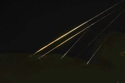 Traces of projectile illuminates the sky seen from northern Israel
