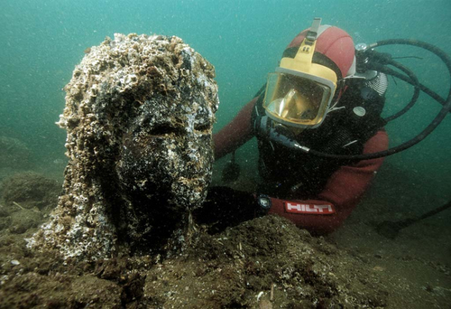 One of the finest finds in Abukir Bay is the remarkable dark stone statue of a 3rd century Ptolemaic queen, very probably Cleopatra II or Cleopatra III, wearing the tunic of the goddess Isis. Picture: Franck Goddio/Hilti Foundation/Christoph Gerigk