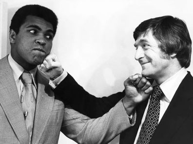 Boxer Muhammad Ali was one of Parkinson's most famous guests, and is pictured sparring with the host on his second visit in 1974