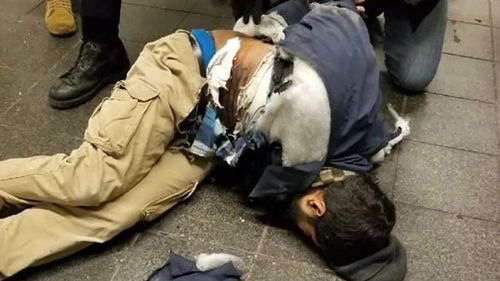 The New York Post published this photo which purports to show Ullah on the ground with wounds to his stomach. 