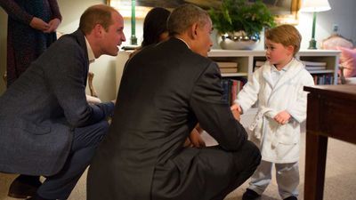 Prince George greets a president in a bathrobe