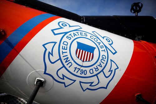FILE PHOTO: The U.S. Coast Guard's logo is seen on an helicopter on the deck of the Coast Guard Cutter Hamilton at Port Everglades, in Fort Lauderdale, Florida, U.S. November 22, 2021. REUTERS/Marco Bello/File Photo