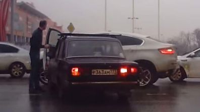 Russian road rager left red faced after forgetting hand brake (Gallery)
