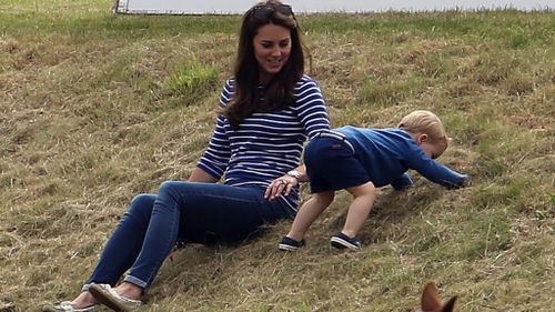 The toddler stole the spotlight while his mother, just six weeks after giving birth to Princess Charlotte, sat nearby. (AAP)