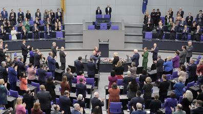 King Charles III, center, is applauded after addressing the Bundestag, Germany&#x27;s Parliament, in Berlin, Thursday, March 30, 2023. 